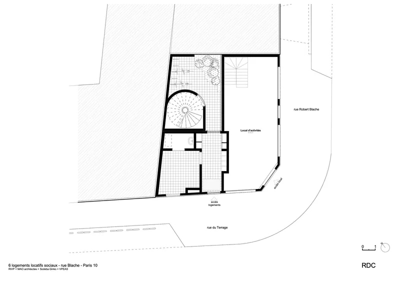 Ground floor plan drawing showing spiral stair volume and tiled terrace areas at building perimeter