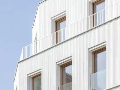 Mobile Architectural Office Stacks Six Timber Homes on a Paris Corner in Ten Days