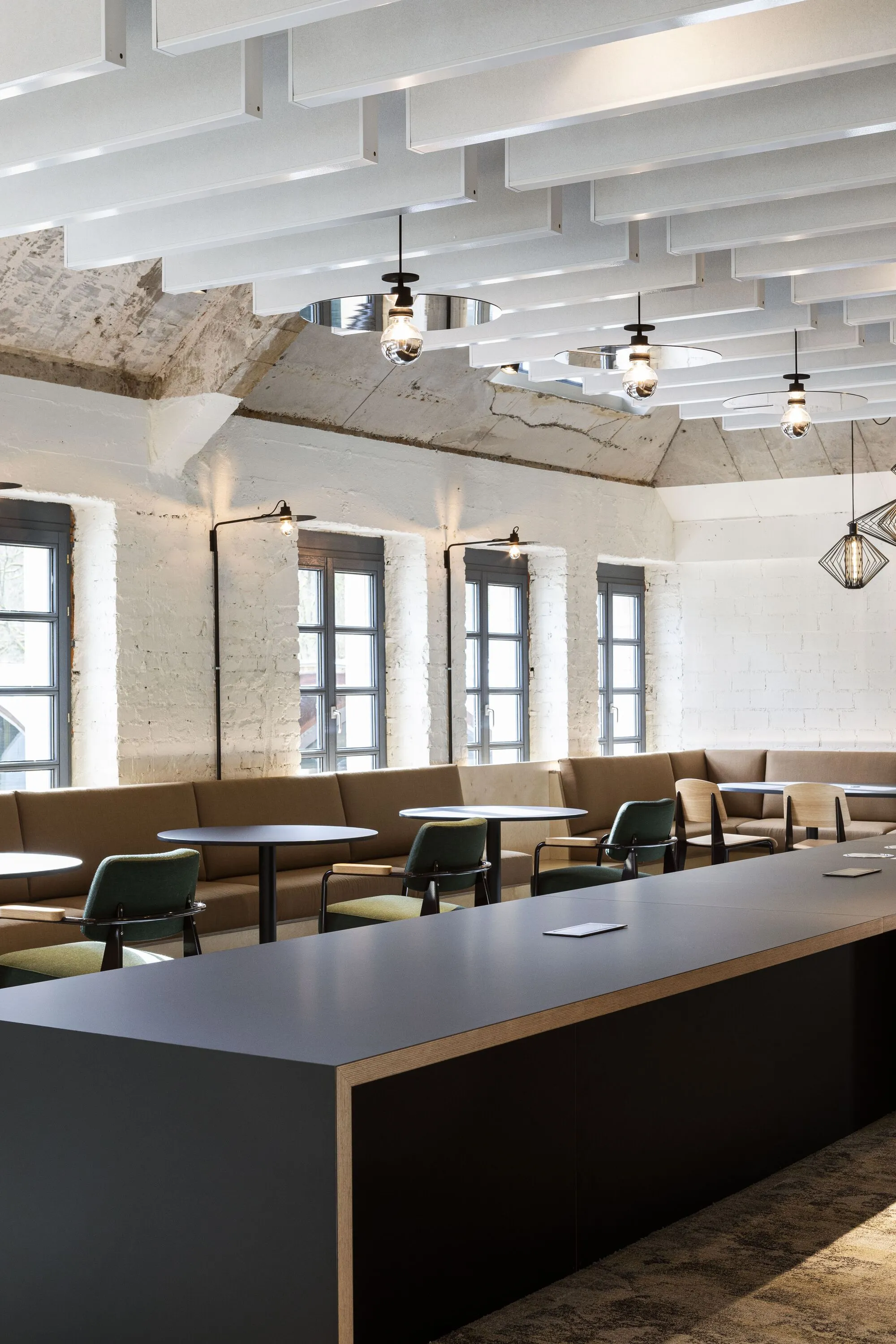 Moreno Architecture Converts a Luxembourg Spa Attic into a Work Café for PwC