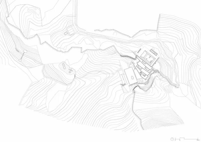 Site plan drawing showing building footprint nestled within contour lines of steep topography