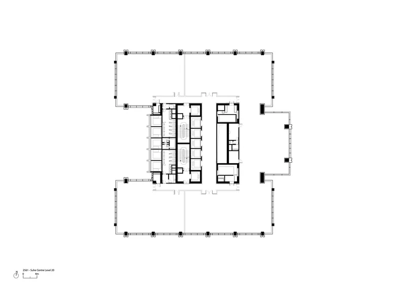 Floor plan showing central service core with vertical circulation and adjacent rooms within a column grid