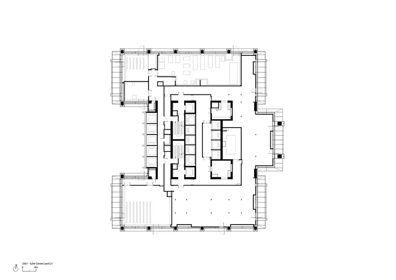 Floor plan showing central core with surrounding open areas and perimeter structural bays with cross-bracing