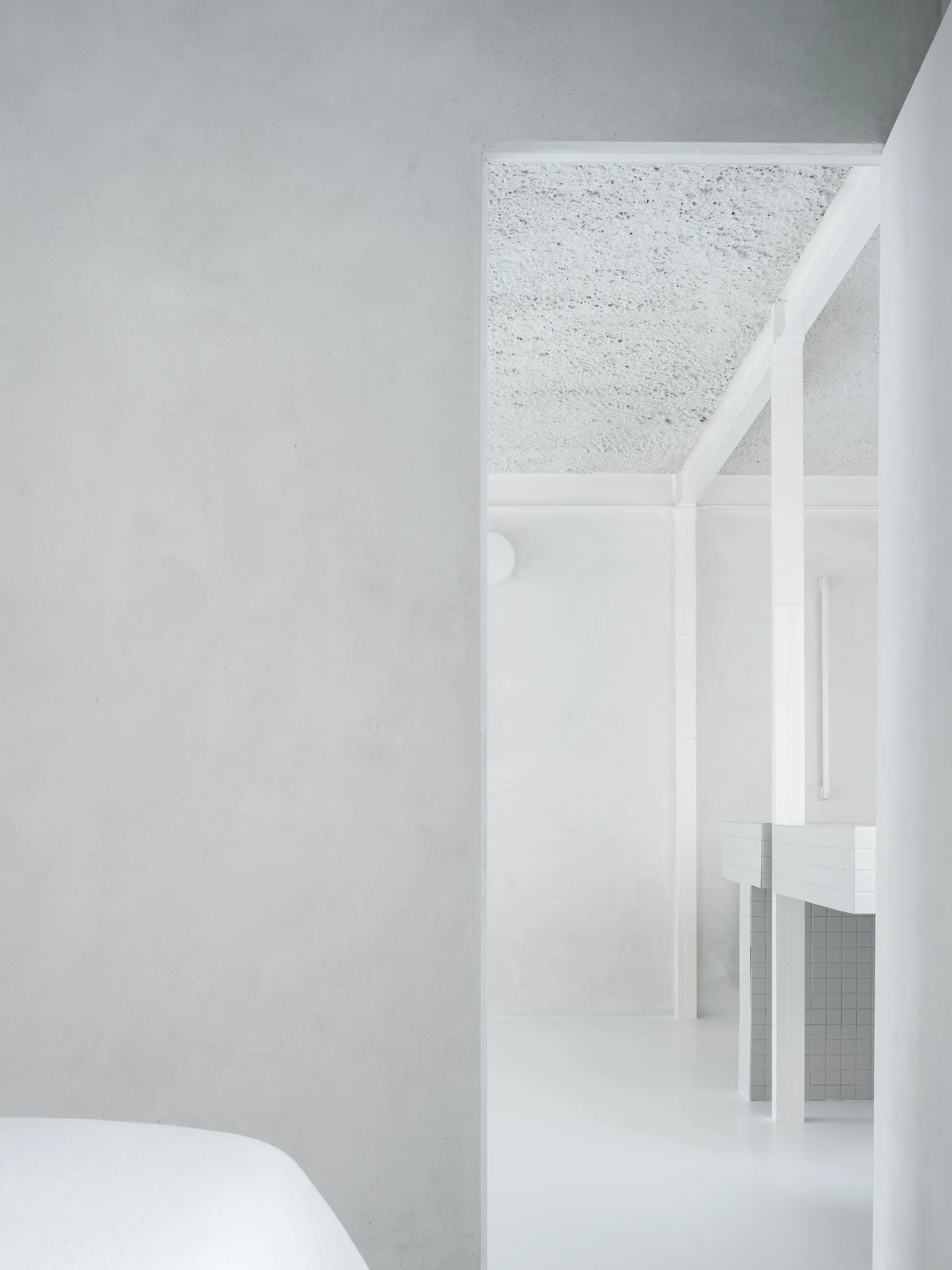 HANGHAR Strips a Madrid Apartment Back to Its Bones to Make Homeownership Possible
