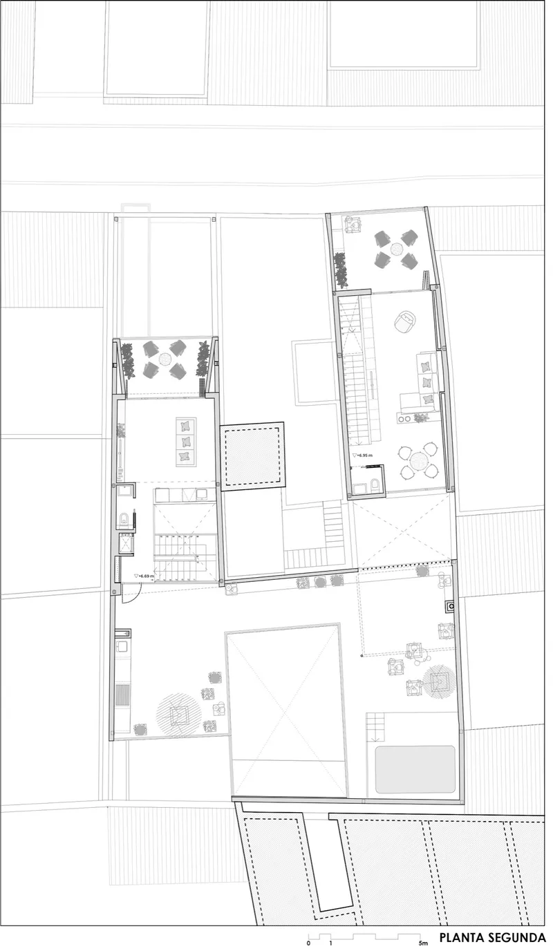 Second floor plan drawing showing roof terraces, outdoor seating areas, and interior living spaces