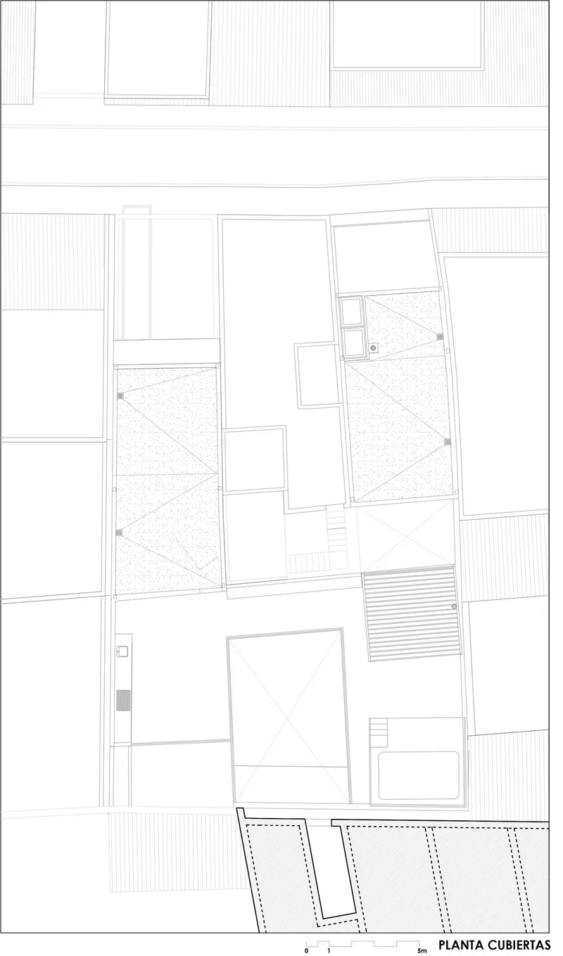Roof plan drawing showing two angled terrace decks and linear hatched paving patterns