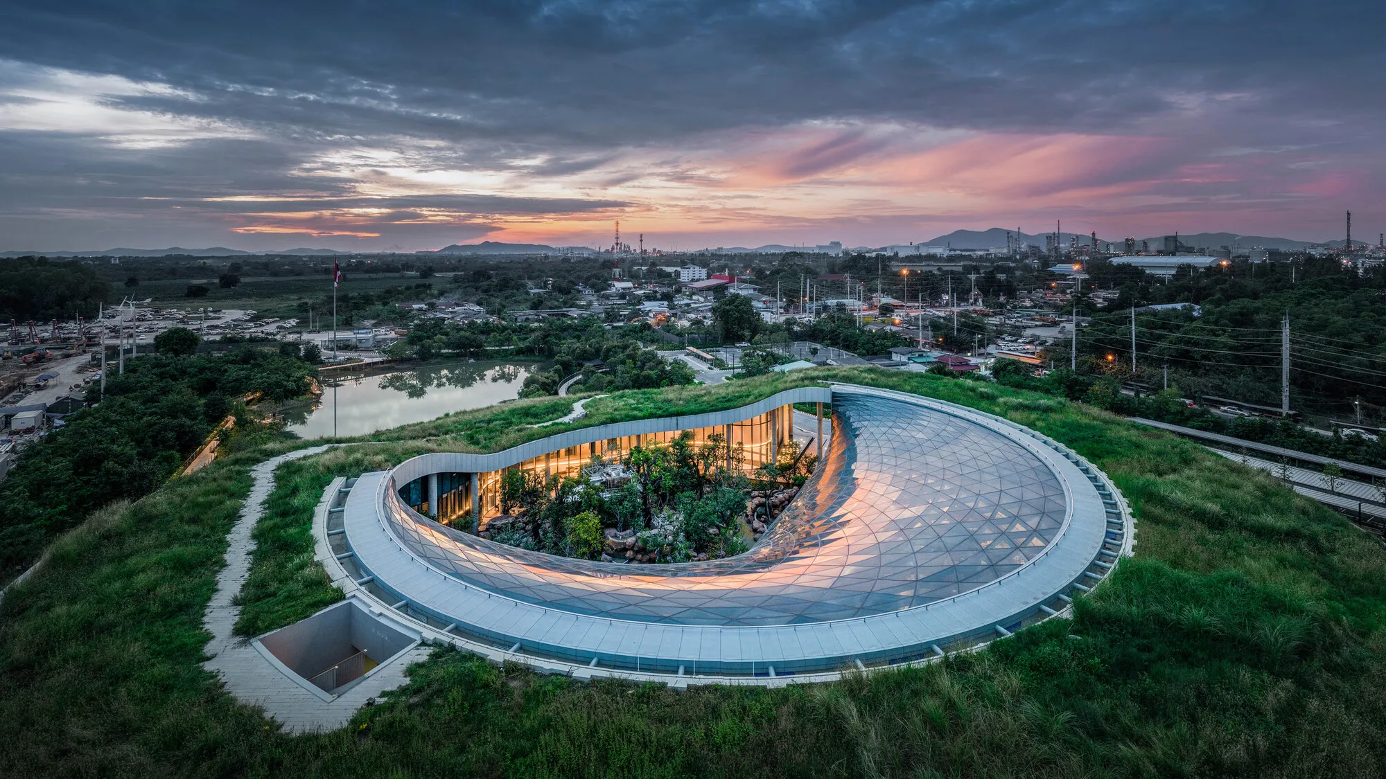 Architects 49 Wraps an LNG Terminal Office in a Living Forest Canopy in Map Ta Phut