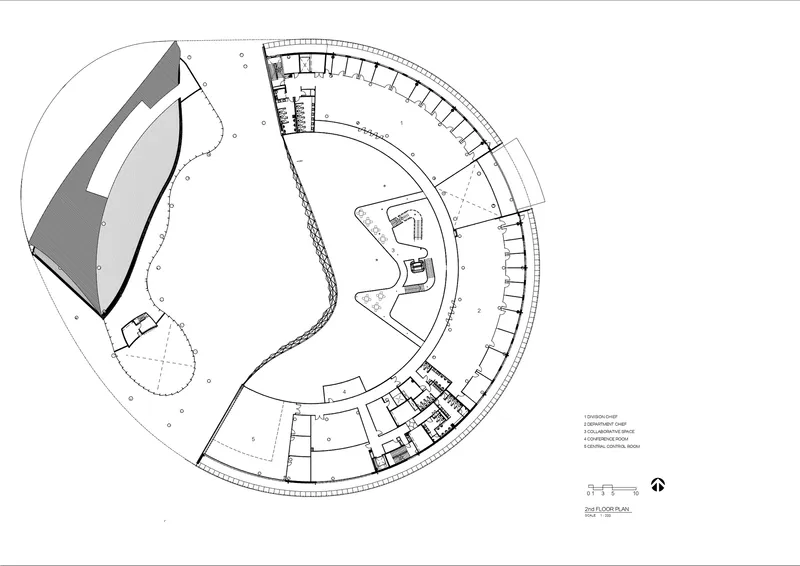Floor plan drawing showing the curved building with a shaded triangular volume on the left side