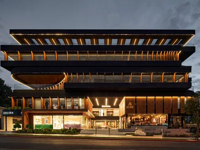 Paz Arquitectura Wraps a Guatemala City Mixed-Use Tower in Rotating Timber Fins