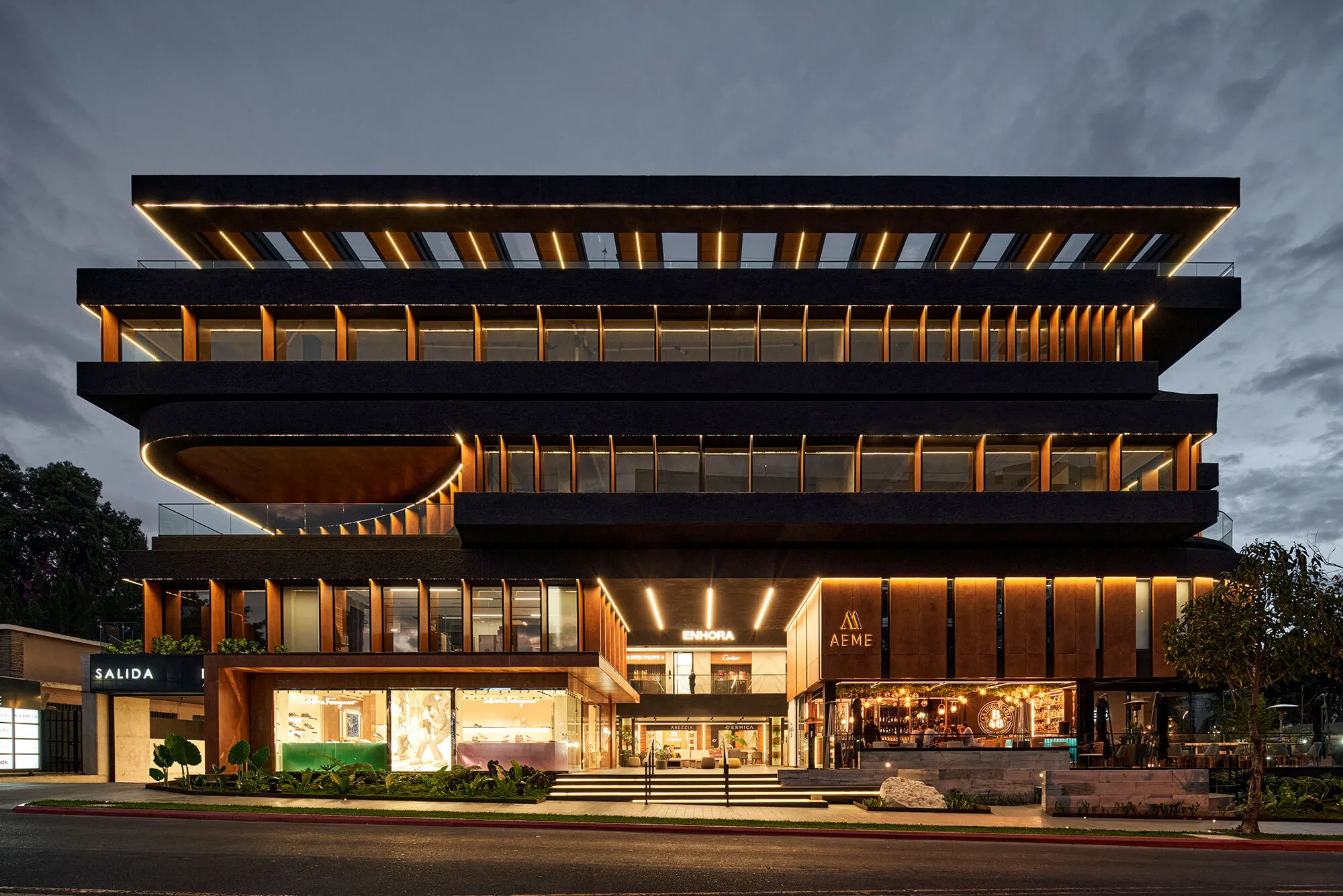 Paz Arquitectura Wraps a Guatemala City Mixed-Use Tower in Rotating Timber Fins