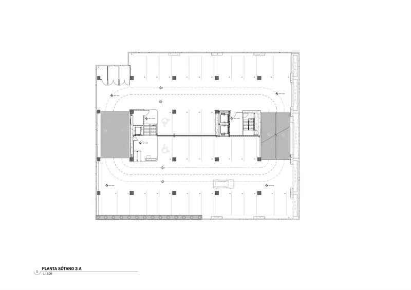Floor plan drawing showing open office layout with central curved circulation zone and perimeter columns