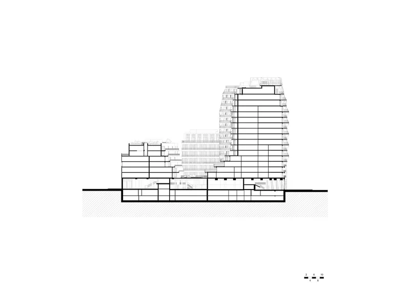 Section drawing showing a tall tapering tower above a podium with underground levels below grade