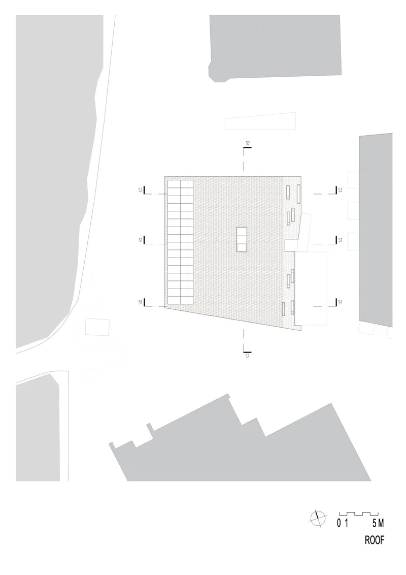 Roof plan drawing with gridded surface and central mechanical equipment enclosure