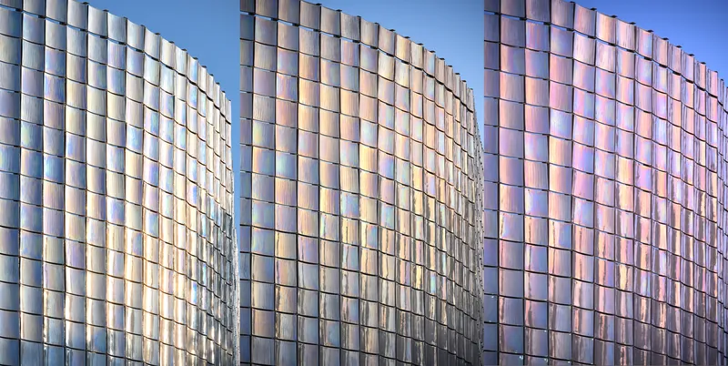 Faceted curves of the iridescent glass panel cladding showing gradations of reflected light
