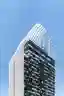 Architects 49 Wraps a 23-Story Pattaya Tower in Vertical Fins and Living Greenery