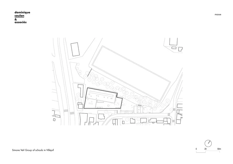 Site plan drawing showing a long rectangular building with landscaped area and adjacent smaller structures