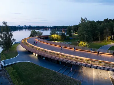 Robert Skitek Wraps a Timber Promenade Around a Polish Lake to Complete a Decade-Long Waterfront