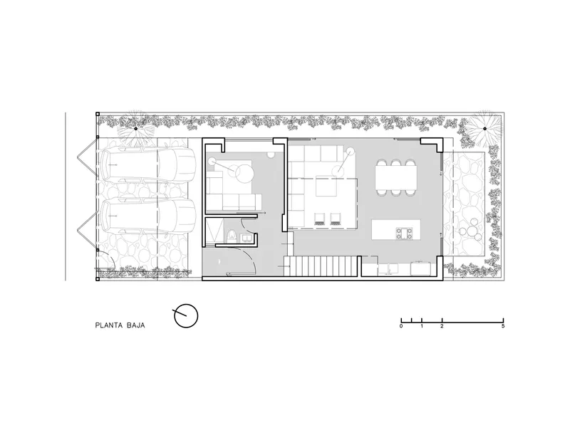 Ground floor plan showing living and dining spaces flanked by a planted courtyard and a garden terrace