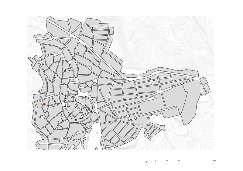 Urban plan drawing showing the street network and building footprints with topographic contour lines