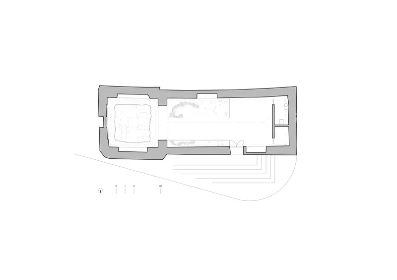 Floor plan drawing showing a rectangular structure with central chamber and adjacent exterior steps
