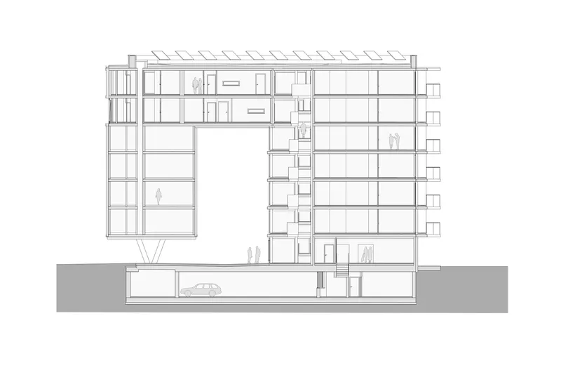 Section drawing through the multi-story housing block showing internal floor levels and circulation core