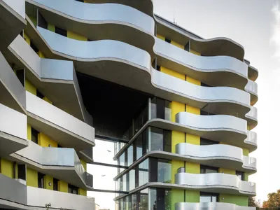 Oberascher and PLOV Pierce a 105-Unit Housing Block to Let Salzburg's Park Breathe Through
