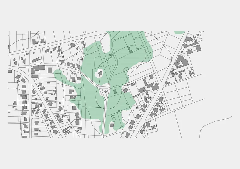 Site plan drawing with green-shaded areas showing parkland and pathways within an urban street grid