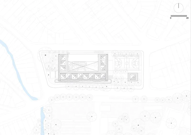 Site plan drawing depicting rectangular building footprint with sports courts surrounded by scattered landscape circles