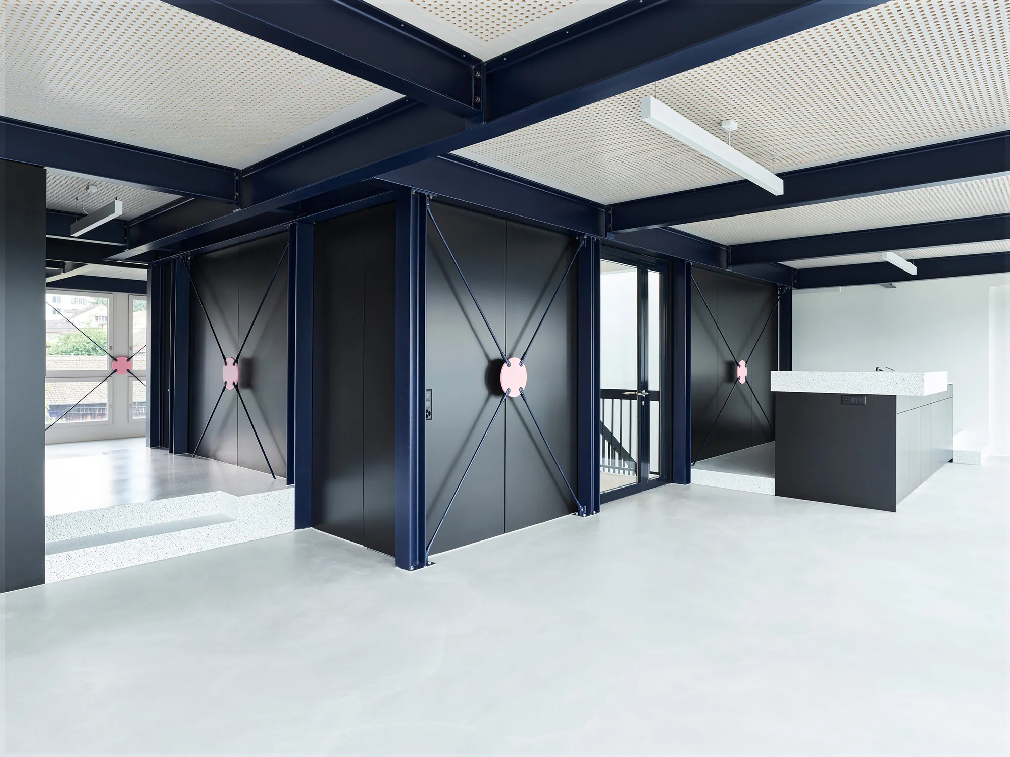 idArchitekt.innen Convert a 1978 Lakeside Office Building in Zollikon into a Kindergarten with a Steel Penthouse