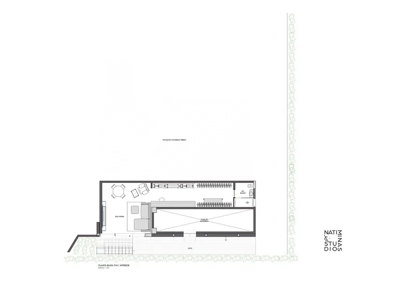 Floor plan drawing showing the interior layout with living spaces and central stairwell