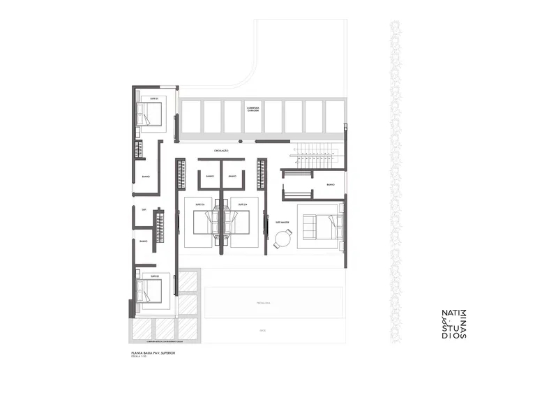 Upper floor plan drawing showing bedrooms, bathrooms, and stairwell with furniture layout indicated