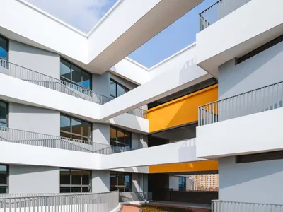 Huajian Group Wraps a Shanghai Primary School Around Circular Courtyards and Rooftop Gardens
