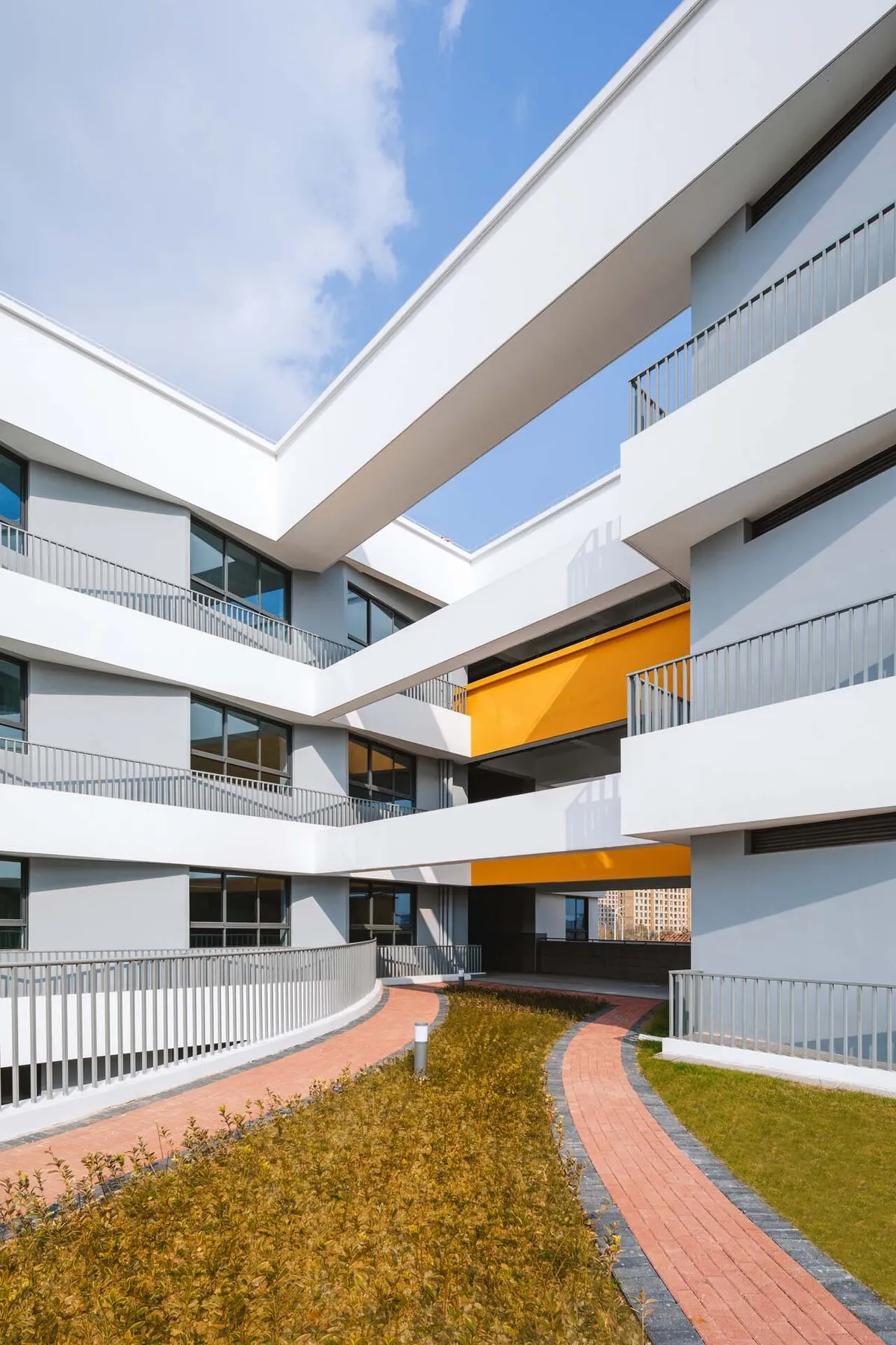 Huajian Group Wraps a Shanghai Primary School Around Circular Courtyards and Rooftop Gardens