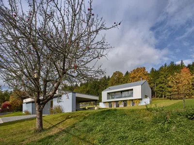 Stempel & Tesar Sink a Family Home into a Czech Hillside Facing the Mountains