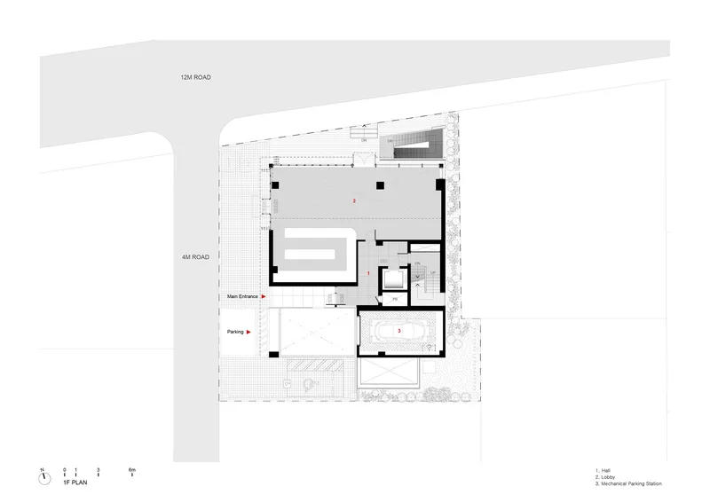 Ground floor plan drawing showing entrance lobby, parking, and service areas between two roads