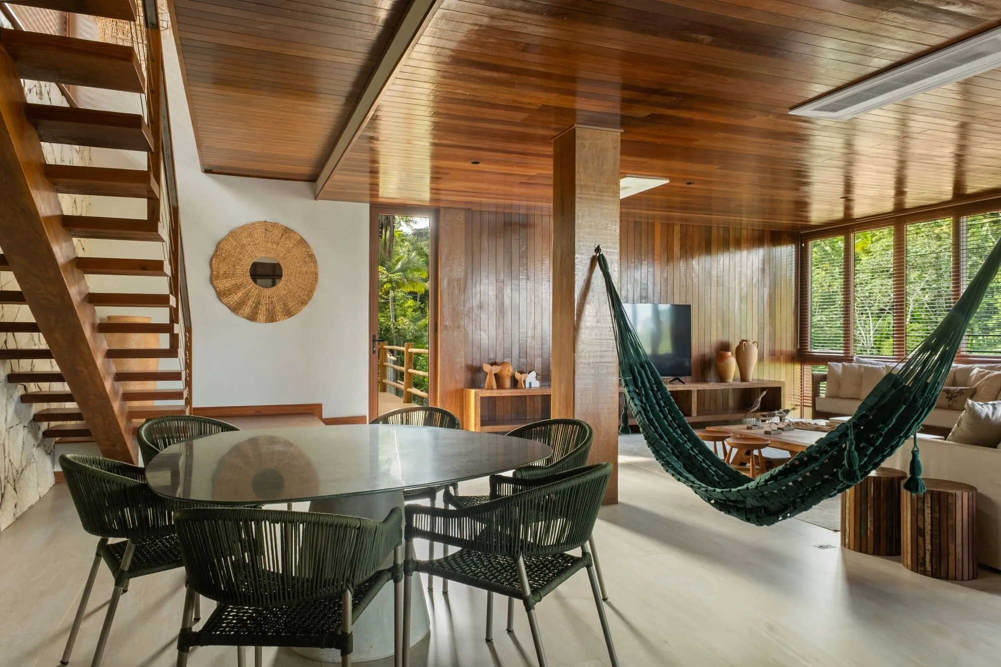 Estúdio Pedro Haruf Carves a Layered Timber House into a Steep Bahian Hillside