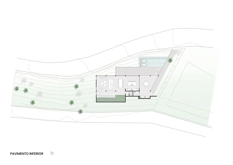 Lower floor plan drawing showing open living spaces and pool terrace on a sloped coastal site