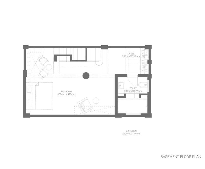 Basement floor plan drawing showing bedroom, toilet, dress room and exterior kitchen below grade