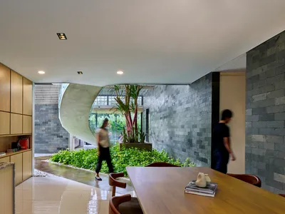 RAD+ar Builds a Low-Energy Shelter Prototype Beneath a Twisted Roof in Tangerang