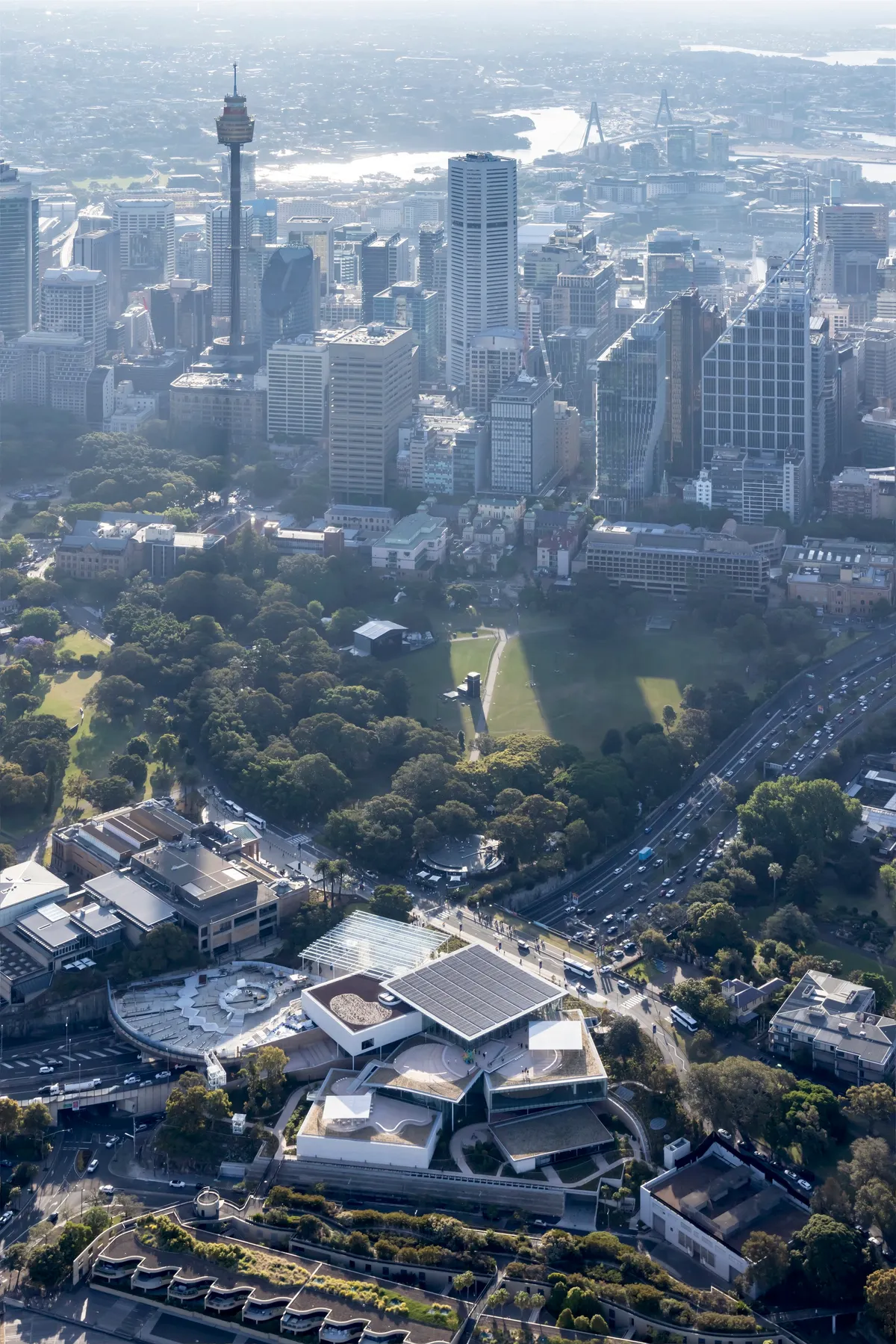 SANAA Steps a Cluster of Glass and Limestone Pavilions Down a Sydney Hillside Toward the Harbour