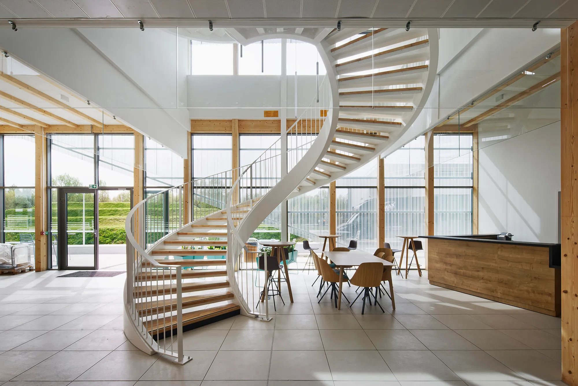 Ateliers A+ Grounds a Railway Training Campus in Landscape and Timber at Bègles