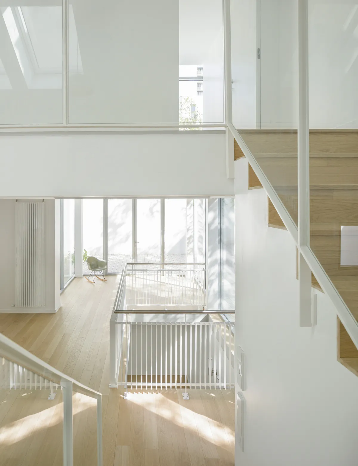 Calmm Architecture Replaces a Tiny Warehouse with a Light-Filled Townhouse in Boulogne-Billancourt