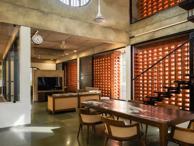 LIJO.RENY.architects Wrap a Kerala Home in a Continuous Perforated Brick Veil