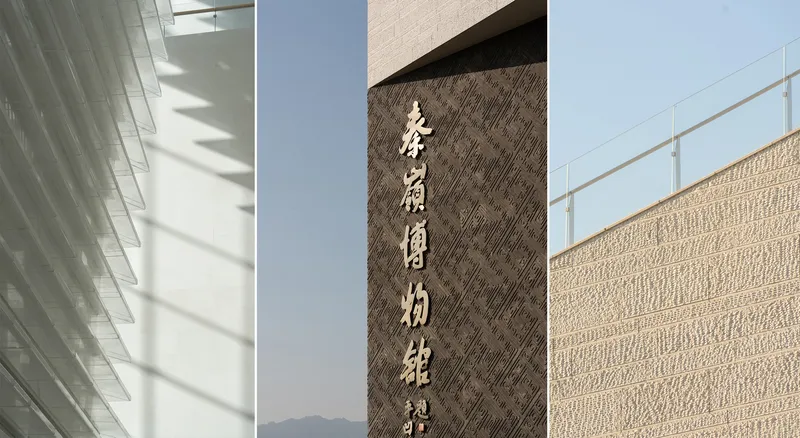 Vertical stone signage panel with carved characters between textured stone wall surfaces in daylight