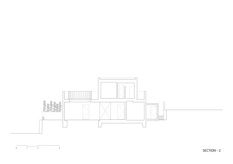 Section drawing showing the interior layout with stairs and openings across sloping ground