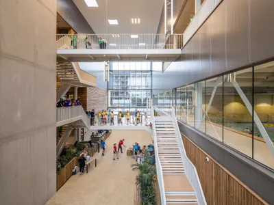 VenhoevenCS Stacks Fifty Sports into One Energy-Neutral Campus Building in Rotterdam