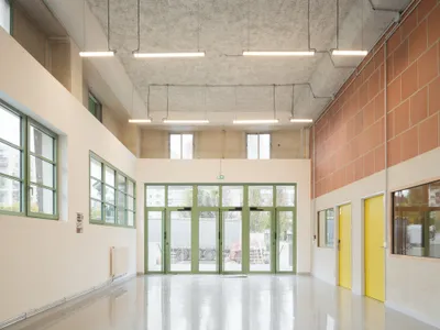 Francois Brugel and Atelier RITA Convert a Parisian Military Bakery into a 438-Bed Emergency Shelter