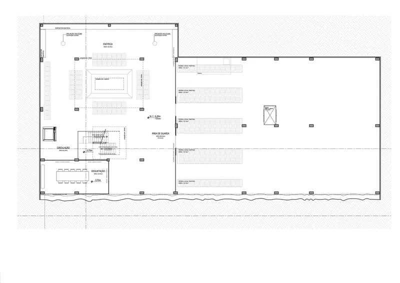 Ground floor plan drawing showing two connected rectangular volumes with central circulation and service spaces