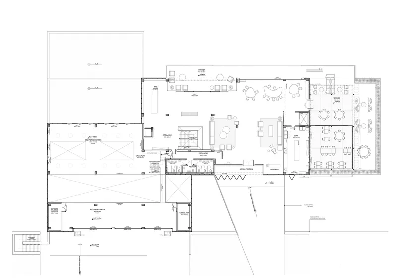 Upper level floor plan drawing showing dining and lounge areas with zigzag circulation spine