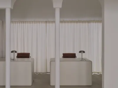 UP2DATE Architects Carve an Arched Sanctuary for Almaty Womenswear Brand Malli