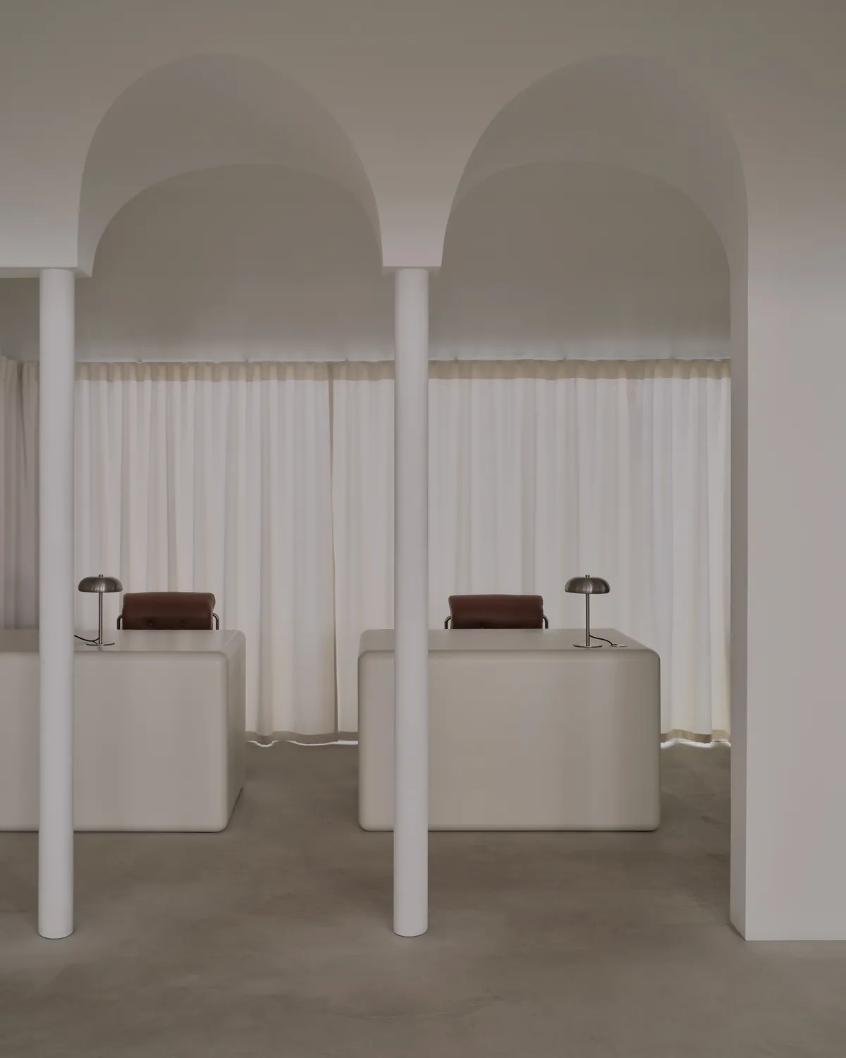 UP2DATE Architects Carve an Arched Sanctuary for Almaty Womenswear Brand Malli